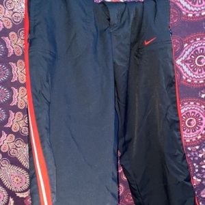 Nike capris with red and white stripe